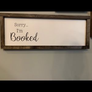 “Sorry... I’m booked.” Sign